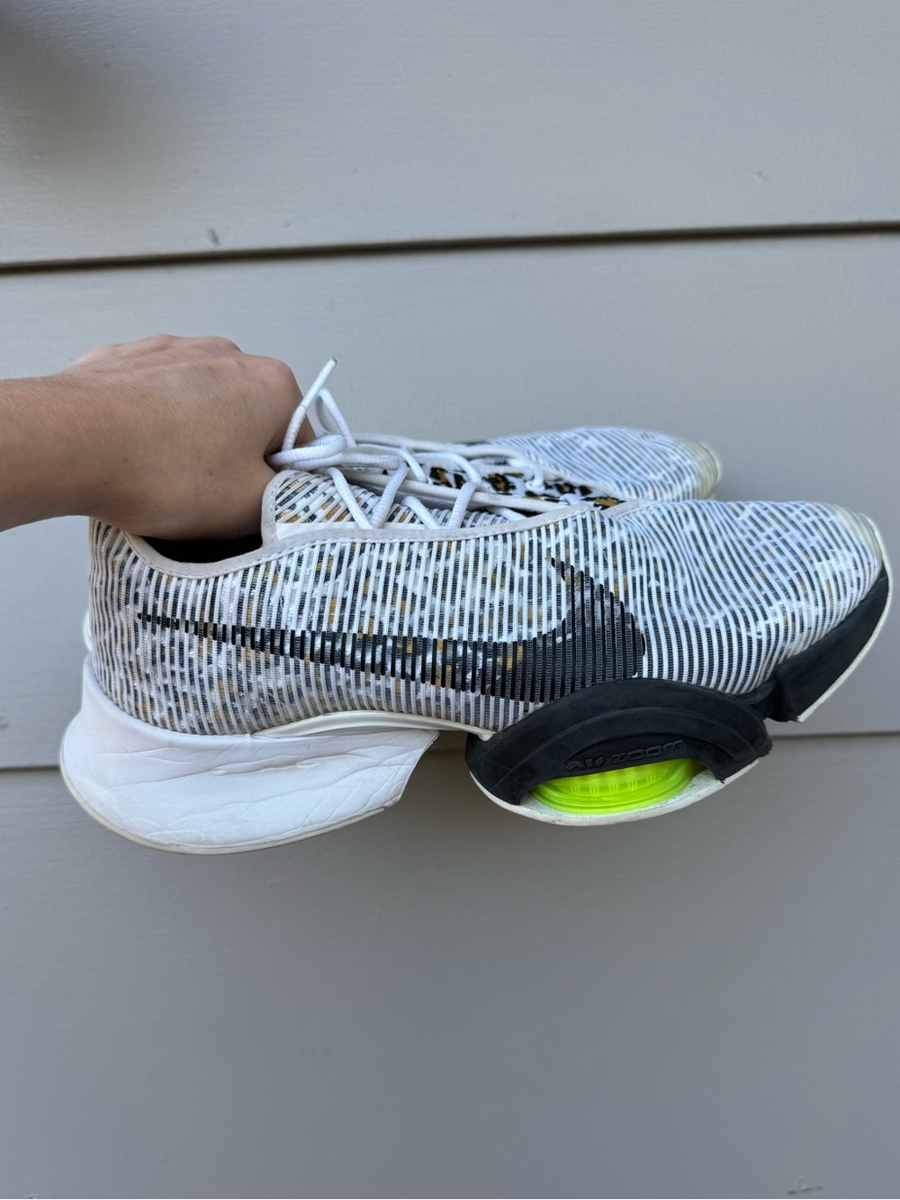 Nike White and Black Running Sneakers with Neon Yellow Accent